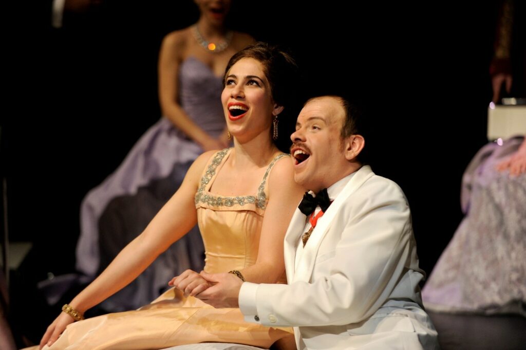 Lucia Cesaroni (Adele) and Gregory Finney (Cesaroni) in Toronto Operetta Theatre's Die Fledermaus. Photo: Gary Beechey