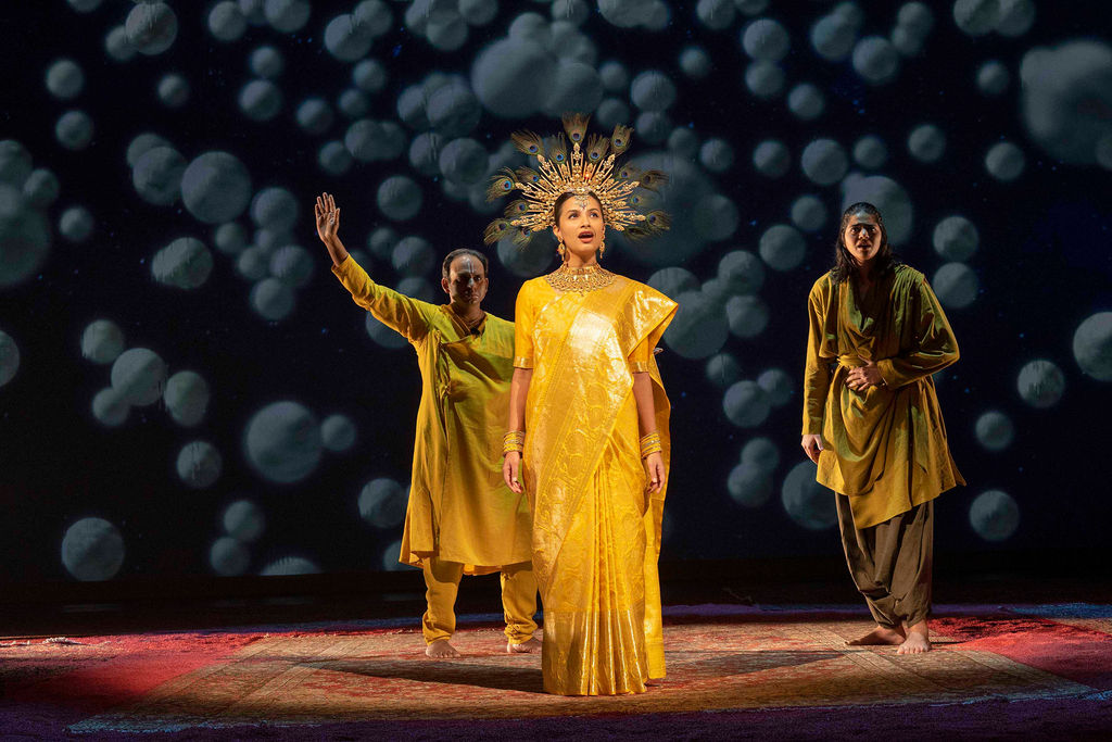 Meher Pavri as the Opera Singer, with Neil D'souza as Krishna and Anaka Maharaj-Sandhu as Arjuna in Why Not Theatre’s Mahabharata (Shaw Festival, 2023). Photo by David Cooper.
